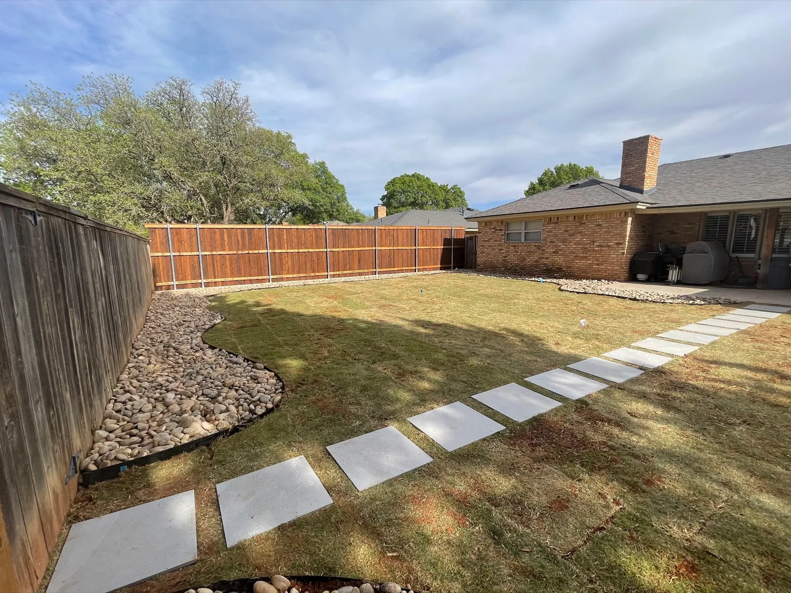Finished backyard landscape by Mission