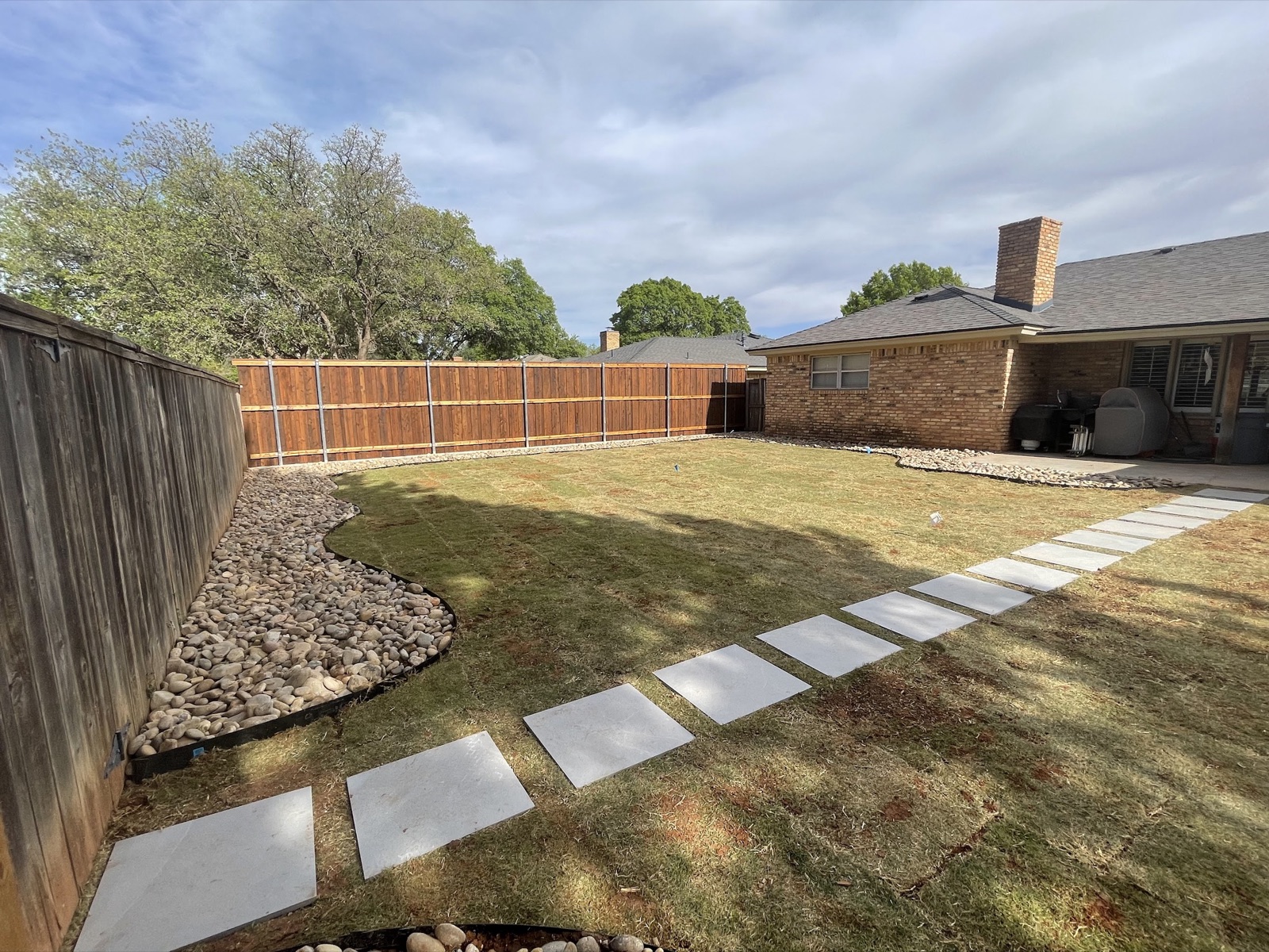 Beautiful backyard by Mission Service Companies — landscape construction Lubbock